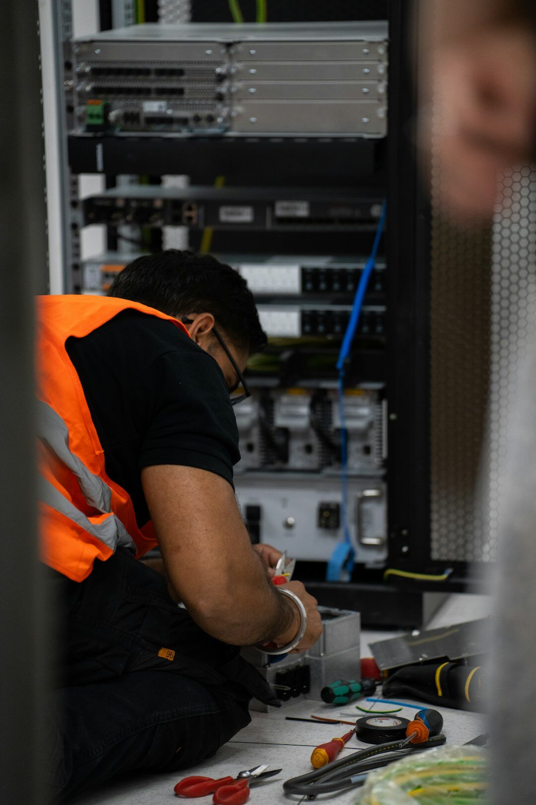 Server room with glowing network cables representing network security
